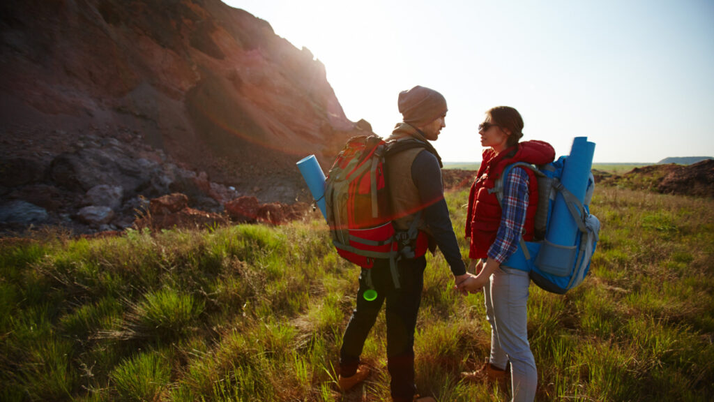 Group of hikers following a marked forest trail