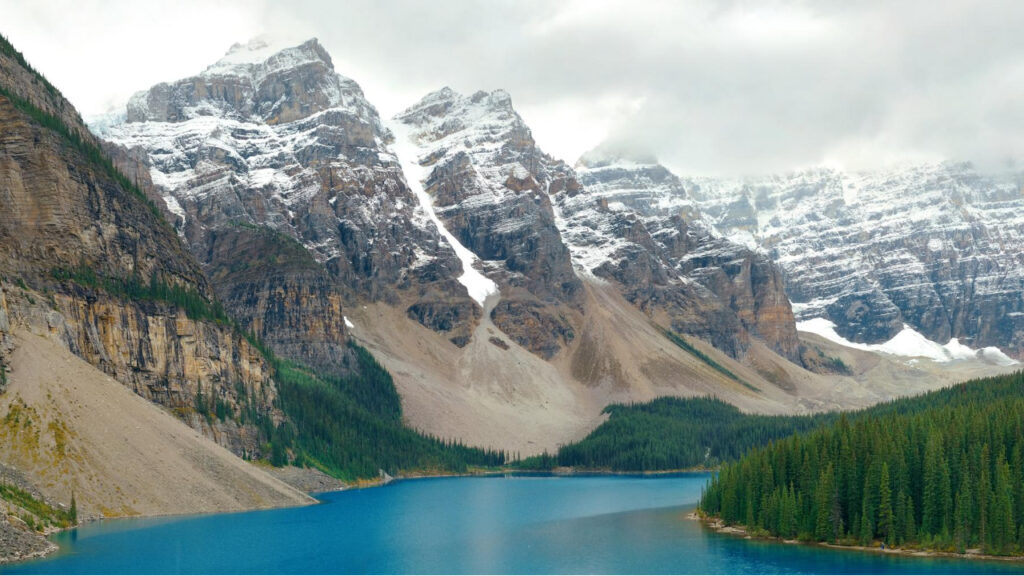 Turquoise lake surrounded by mountains in Banff National Park