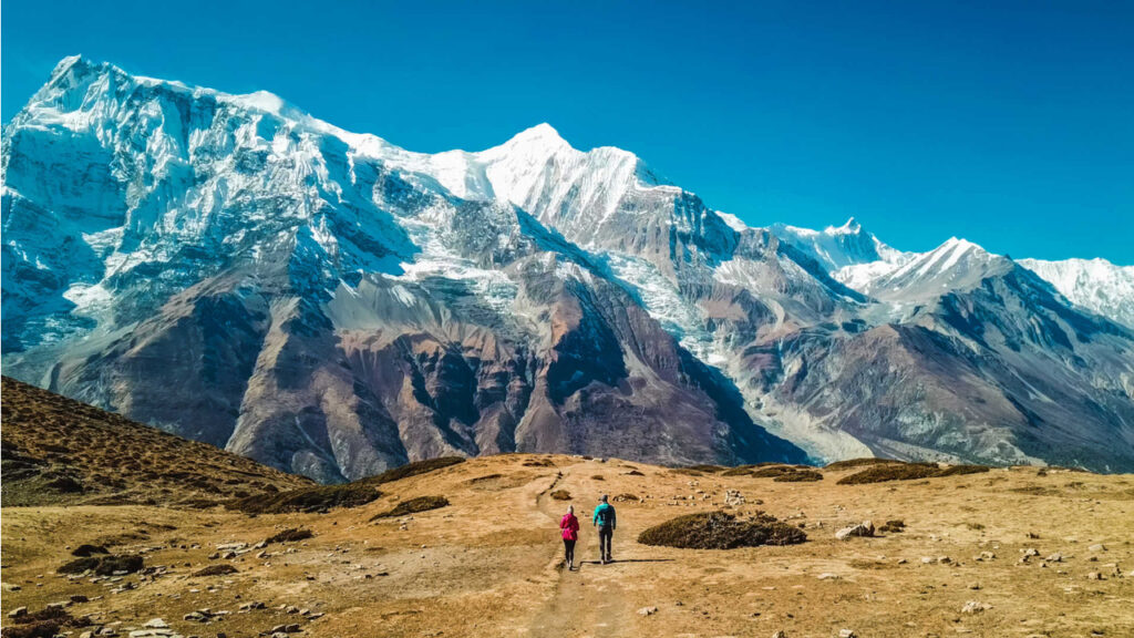 Annapurna Circuit trail with snow-capped Himalayan peaks