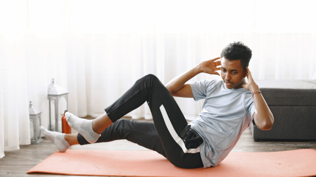 Beginner exercising in living room